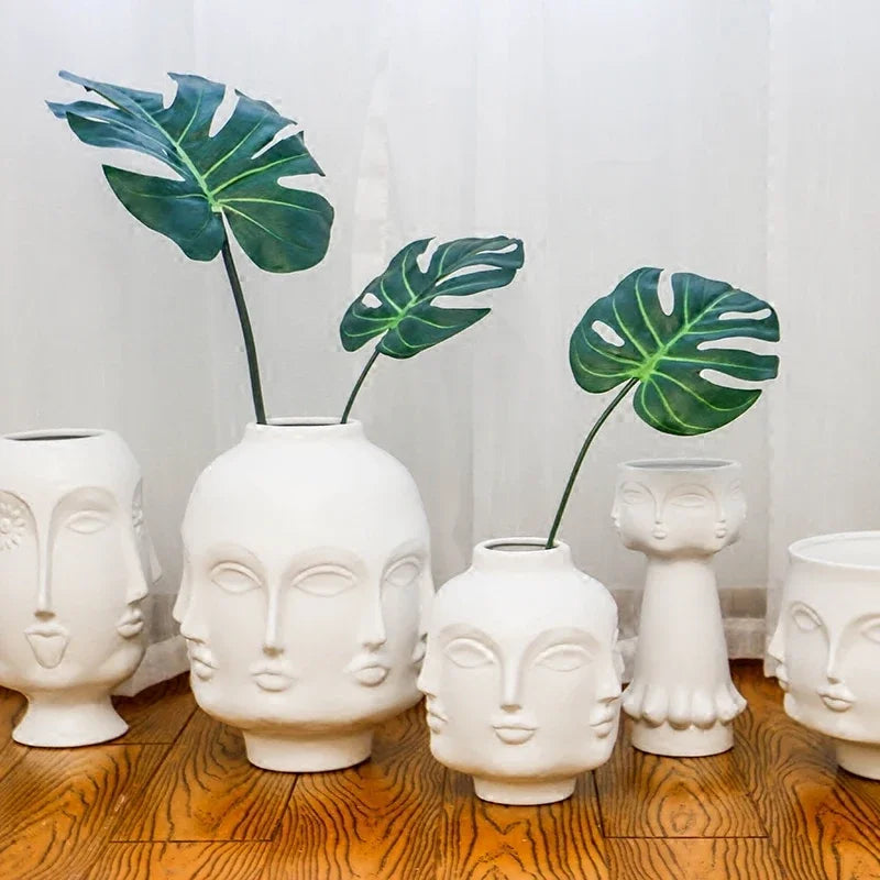 5 DIFFERENT FACE VASES DESIGNS