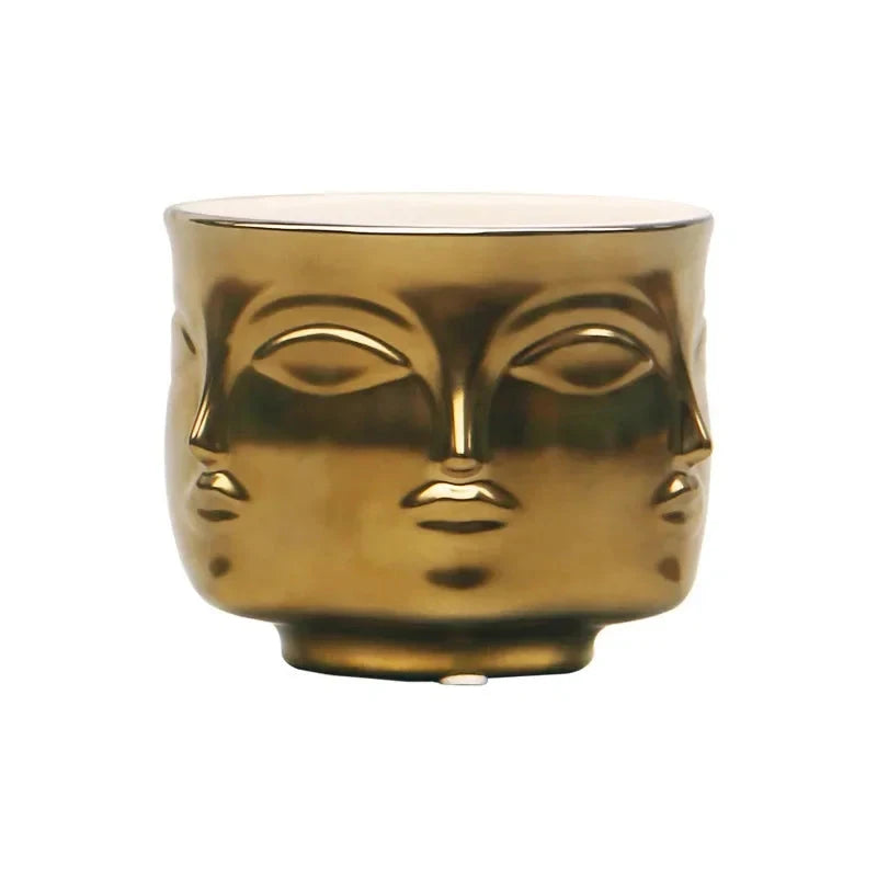 GOLD COLOUR VASE FACE DESIGN